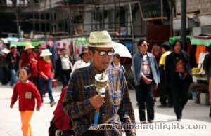 A prayer wheel for the local people on Barkon Street.